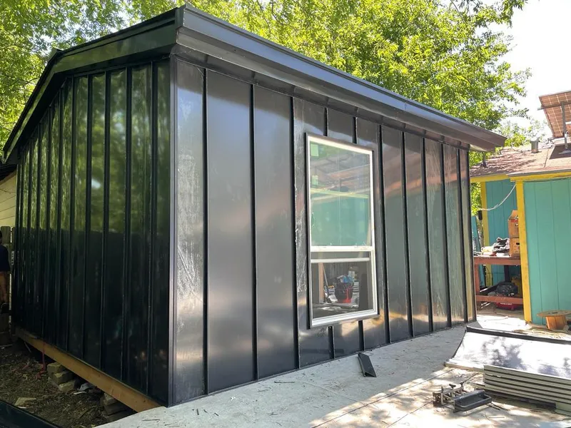 Black standing seam metal wall panels for Roof Inspection in Lake Goodwin
