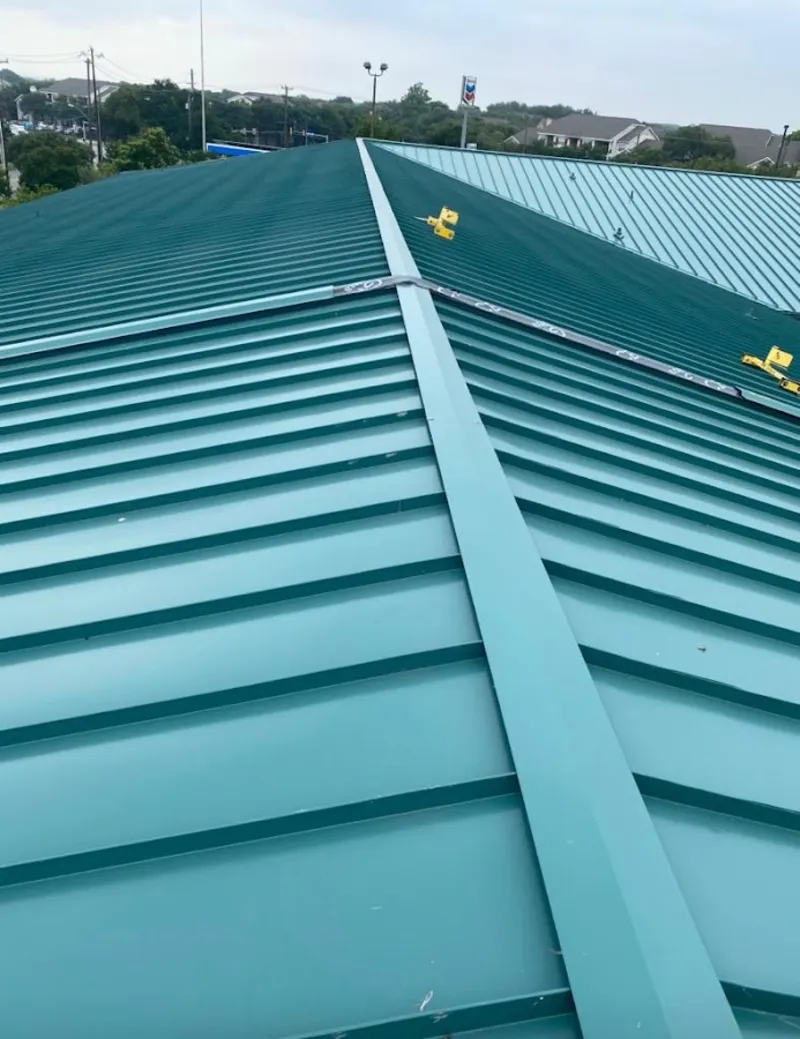 Green commercial metal roof ridge and valley for Metal Roof Repair in Lake Goodwin